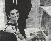 photo from the 50s or 60s of woman at computer